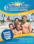 four children smiling at the camera while enjoying Sunburst Bay Aquatic Center